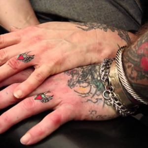 12 Coolest Wedding Ring Tattoo Designs