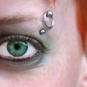 50 of the Most Amazing Eyebrow Piercing Designs